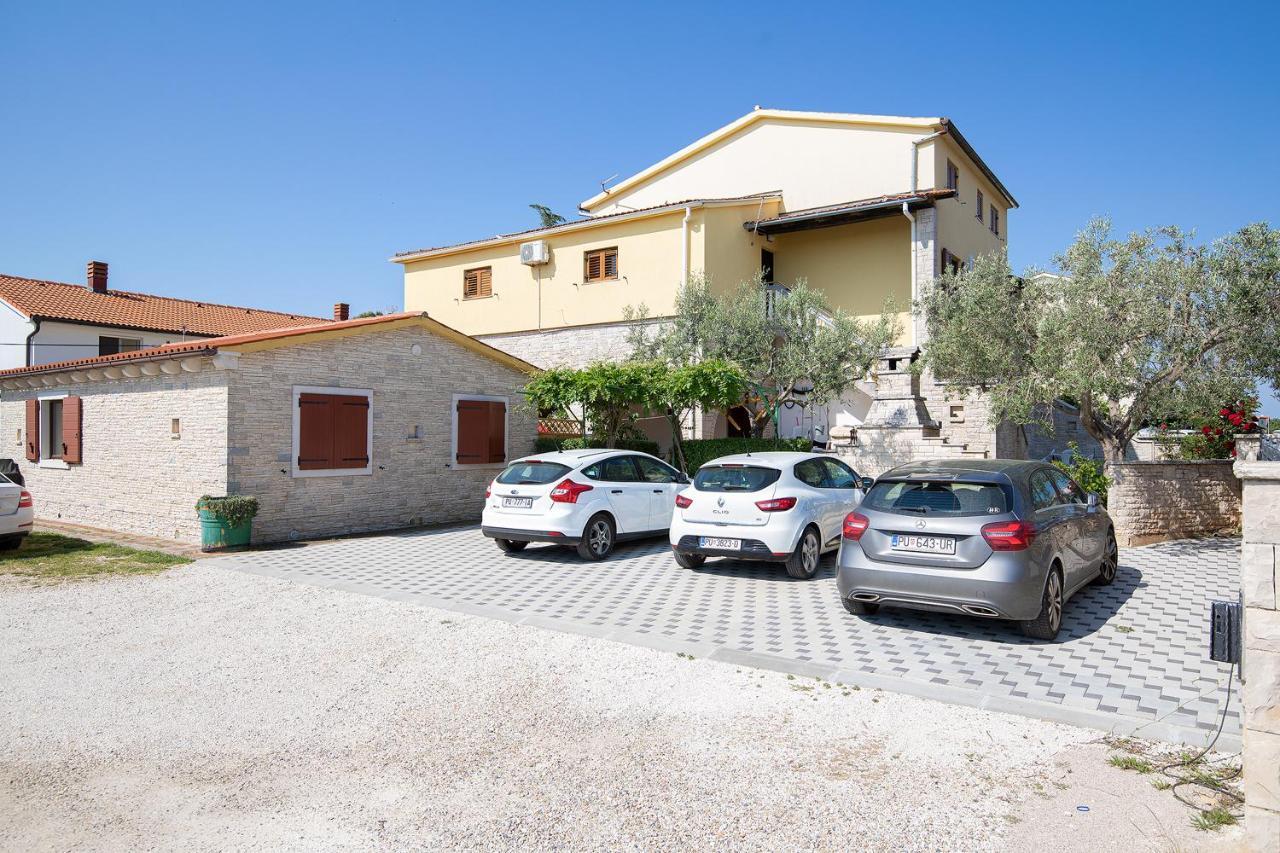 Modern Stone House With Flowers & Playground Medulin Exterior photo